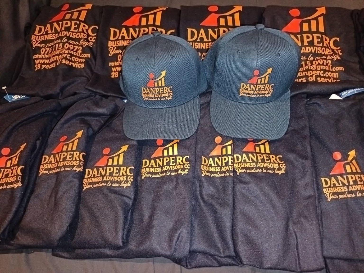 Danperc branded shirts and caps